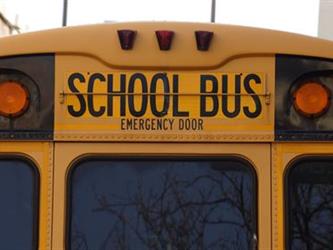 The top of a yellow school bus